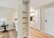 Thumbnail 6 of 38 - a renovated living room and kitchen with a white door