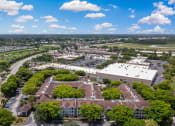 Thumbnail 29 of 38 - an aerial view of a city with buildings and trees