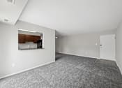Thumbnail 5 of 22 - Glen Willow Apartments Living space view of entry
