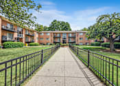 Thumbnail 21 of 22 - Glen Willow Apartments courtyard walkway