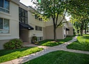 Thumbnail 28 of 33 - Ashley Apartments Tree-lined Entry Photo
