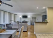 Thumbnail 5 of 50 - a view of the living room and dining room from the kitchen
