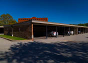 Thumbnail 11 of 43 - Laurel Village Apartments Carport 001