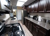 Thumbnail 34 of 43 - Laurel Village Apartments 1BD Kitchen 016