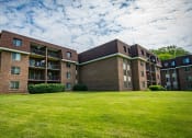 Thumbnail 23 of 28 - Oakton Park Apartments Building Exterior Far 25