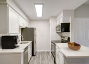 Thumbnail 4 of 29 - Kitchen with