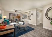 Thumbnail 4 of 28 - Stone Arbor Living Room and Kitchen