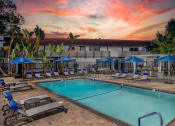 Thumbnail 23 of 28 - Stone Arbor Pool Deck with Lounge Chairs