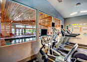 Thumbnail 14 of 24 - view from fitness center to indoor pool
