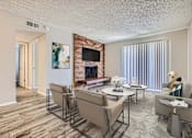 Thumbnail 9 of 28 - our apartments offer a living room with a fireplace