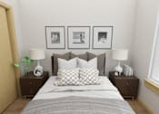 Thumbnail 10 of 36 - A bedroom with a bed, two lamps, and three pictures on the wall.