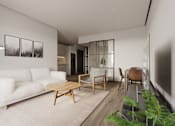 Thumbnail 10 of 24 - A white couch sits in a living room with a wooden coffee table in front of it at The Woods at 180 Kanata Avenue, Kanata, Ontario