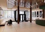 Thumbnail 15 of 24 - the lobby of a building with a reception desk and chairs at The Woods at 180 Kanata Avenue, Ontario