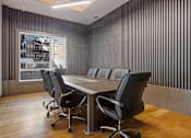 Thumbnail 20 of 34 - A conference room with a long table and chairs at The Woods at 180 Kanata Avenue Apartments, Ontario