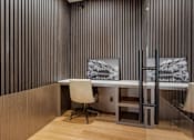 Thumbnail 18 of 34 - A room with a desk and a chair at The Woods at 180 Kanata Avenue Apartments, Kanata, K2T 0T4