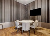 Thumbnail 23 of 34 - A conference room with a white table and chairsat The Woods at 180 Kanata Avenue Apartments, Kanata, ON K2T 0T4