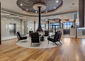 Thumbnail 22 of 34 - A modern conference room with a large table and chairs at The Woods at 180 Kanata Avenue Apartments, Ontario, K2T 0T4