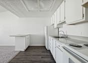 Thumbnail 4 of 21 - Apartment kitchen area at Tanglewood Apartments