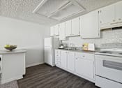 Thumbnail 3 of 21 - Apartment kitchen at Tanglewood Apartments