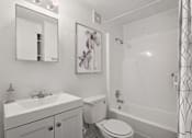 Thumbnail 8 of 21 - apartment bathroom with a sink and a mirror at Tanglewood Apartments