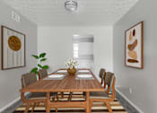 Thumbnail 3 of 18 - A dining room with a wooden table and chairs.