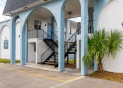 Thumbnail 17 of 19 - Apartment building exterior at Bella Mar Apartments