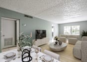Thumbnail 2 of 19 - A living room with a dining table set for two and a television.