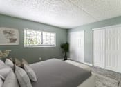 Thumbnail 5 of 19 - A bedroom with a bed, pillows, and a window.