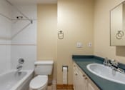 Thumbnail 20 of 64 - a bathroom with a sink toilet and bathtub