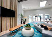Thumbnail 6 of 95 - a clubhouse room with couches and a coffee table at Presidio Palms Apartments, Tucson, AZ