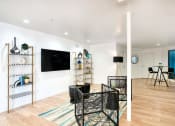 Thumbnail 15 of 95 - Living Room With Television at Presidio Palms Apartments, Tucson