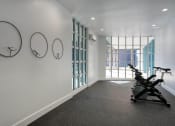 Thumbnail 19 of 95 - Yoga room with an exercise bike at Presidio Palms Apartments, Tucson