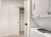 Thumbnail 29 of 95 - a washer and dryer in a laundry room at Presidio Palms Apartments, Tucson, AZ, 85701