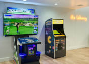 Thumbnail 68 of 95 - the game room has video games and a large screen tv at Presidio Palms Apartments, Arizona