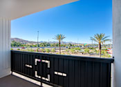Thumbnail 78 of 95 - A balcony with a view of the mountains at Presidio Palms Apartments, Tucson, 85701