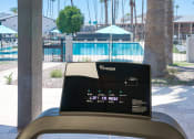 Thumbnail 60 of 95 - a view of a swimming pool from the inside of a treadmill at Presidio Palms Apartments, Tucson, 85701