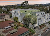 Thumbnail 1 of 31 - Village lofts at sunset