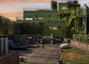 Thumbnail 4 of 31 - Deck at Village lofts at sunset