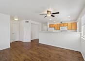 Thumbnail 26 of 33 - Kitchen and open living room