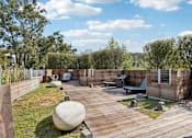 Thumbnail 7 of 31 - A wooden deck