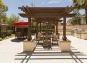 Thumbnail 10 of 38 - a patio with a pergola