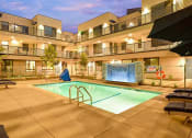 Thumbnail 3 of 25 - Pool with chairs and views of balconies