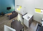 Thumbnail 28 of 31 - overhead shot of kitchen, living and dinning room area