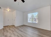 Thumbnail 48 of 61 - an empty living room with a large window