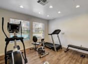 Thumbnail 13 of 61 - the fitness center at Versailles Senior Apartments