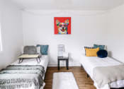 Thumbnail 12 of 46 - a bedroom with two beds