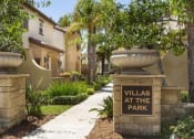 Thumbnail 16 of 38 - a villas at the park sign in front of a house