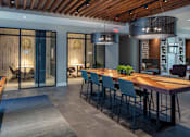 Thumbnail 10 of 53 - Community workspace with communal table and conference rooms at Inwood at Renaissance Square Apartments, Marlton, NJ