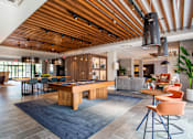 Thumbnail 1 of 53 - Community lounge with billiards table and wood beam ceiling at Inwood at Renaissance Square Apartments, Marlton, New Jersey