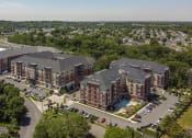 Thumbnail 75 of 80 - an aerial view of a large apartment complex in a city